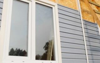 vinyl siding being installed